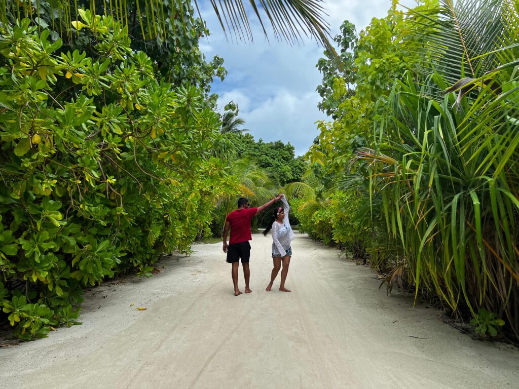 Kuramathi Maldives Review - Couple Walk